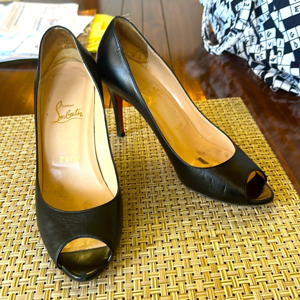 Christian Louboutin, black peep, toe, infamous shoes.